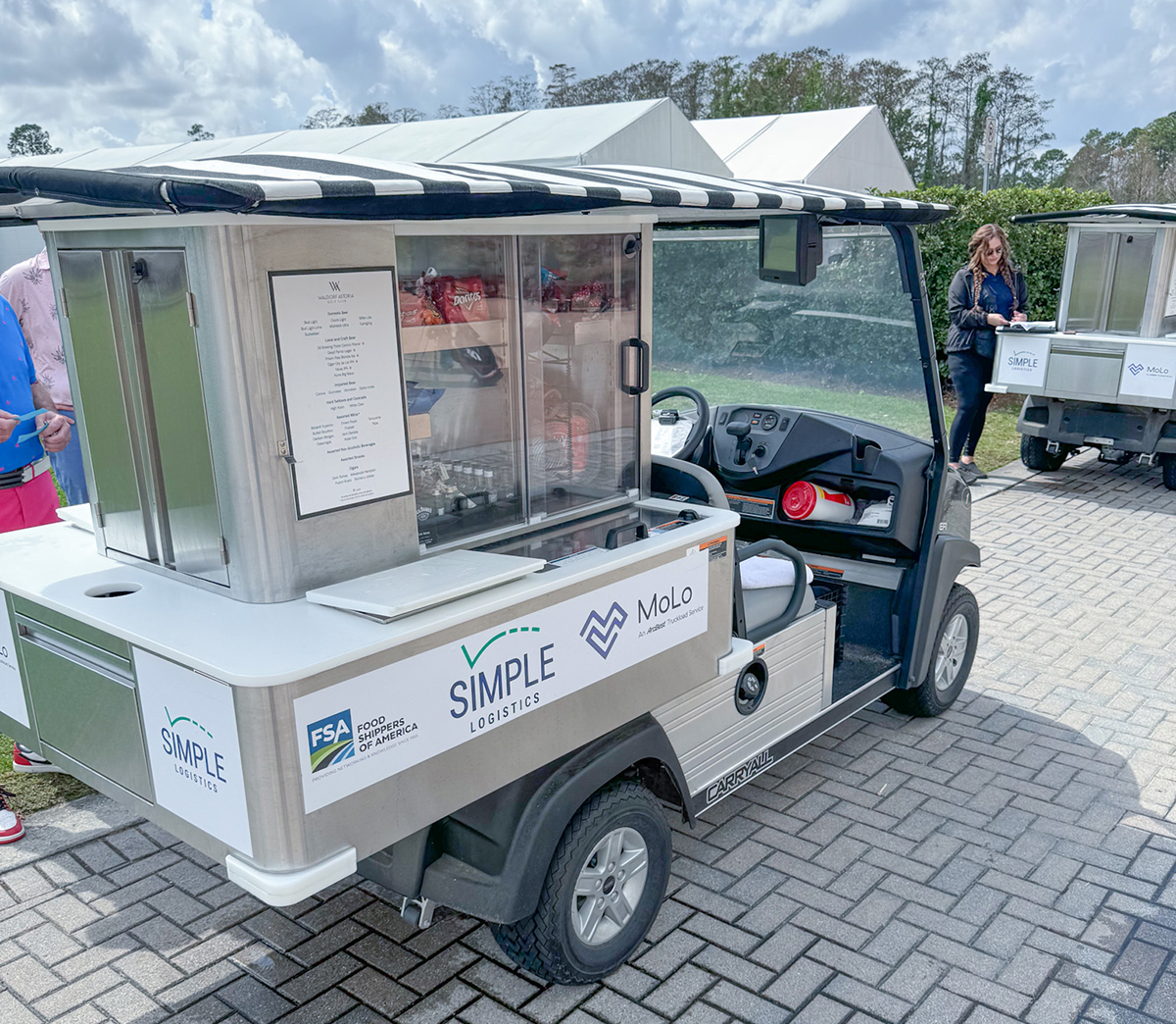 Golf Beverage Cart with Simple Logistics logo on the side and back of the cart.